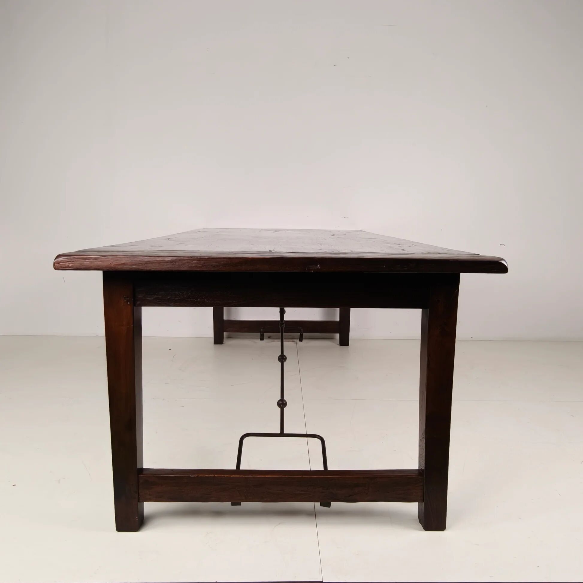 Large Spanish oak dining table with wrought iron bars – 20th century