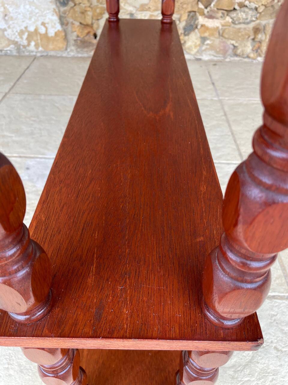 Vintage 5-tier turned wood shelf on legs.