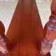 Vintage 5-tier turned wood shelf on legs.
