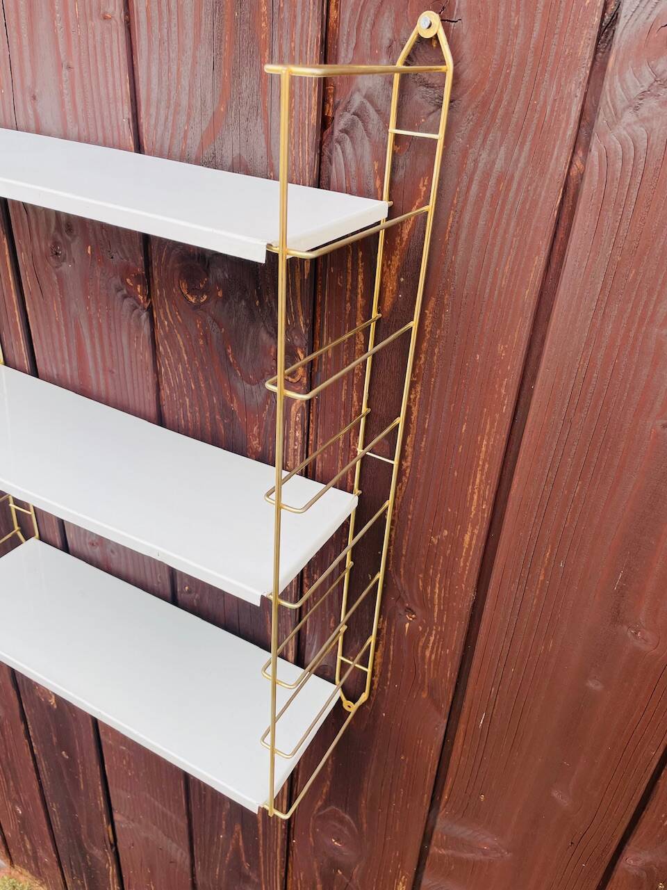 Vintage modular wall shelf, metal and brass, circa 1960s