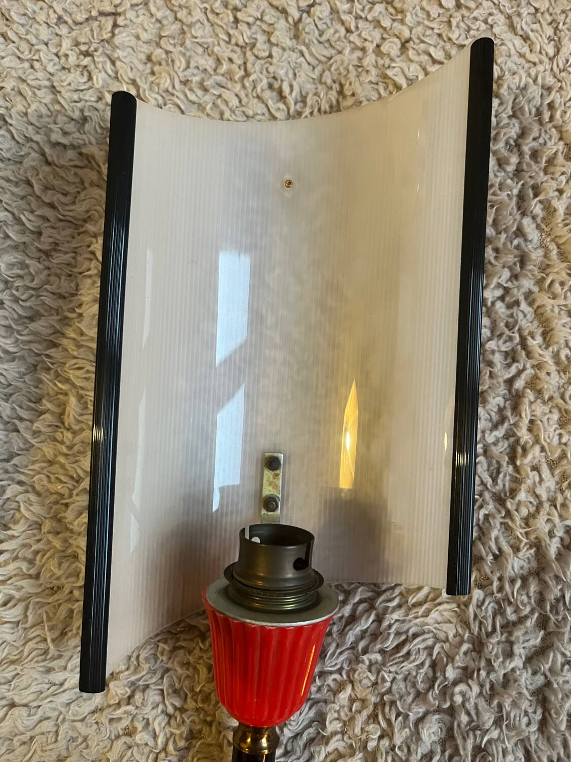 Pair of circa 70s plastic and brass wall lights