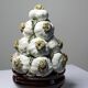 Vintage trompe-l'œil garlic pyramid in glazed ceramic from Manises, Spain.
