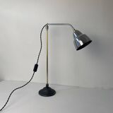 Old industrial articulated workshop lamp