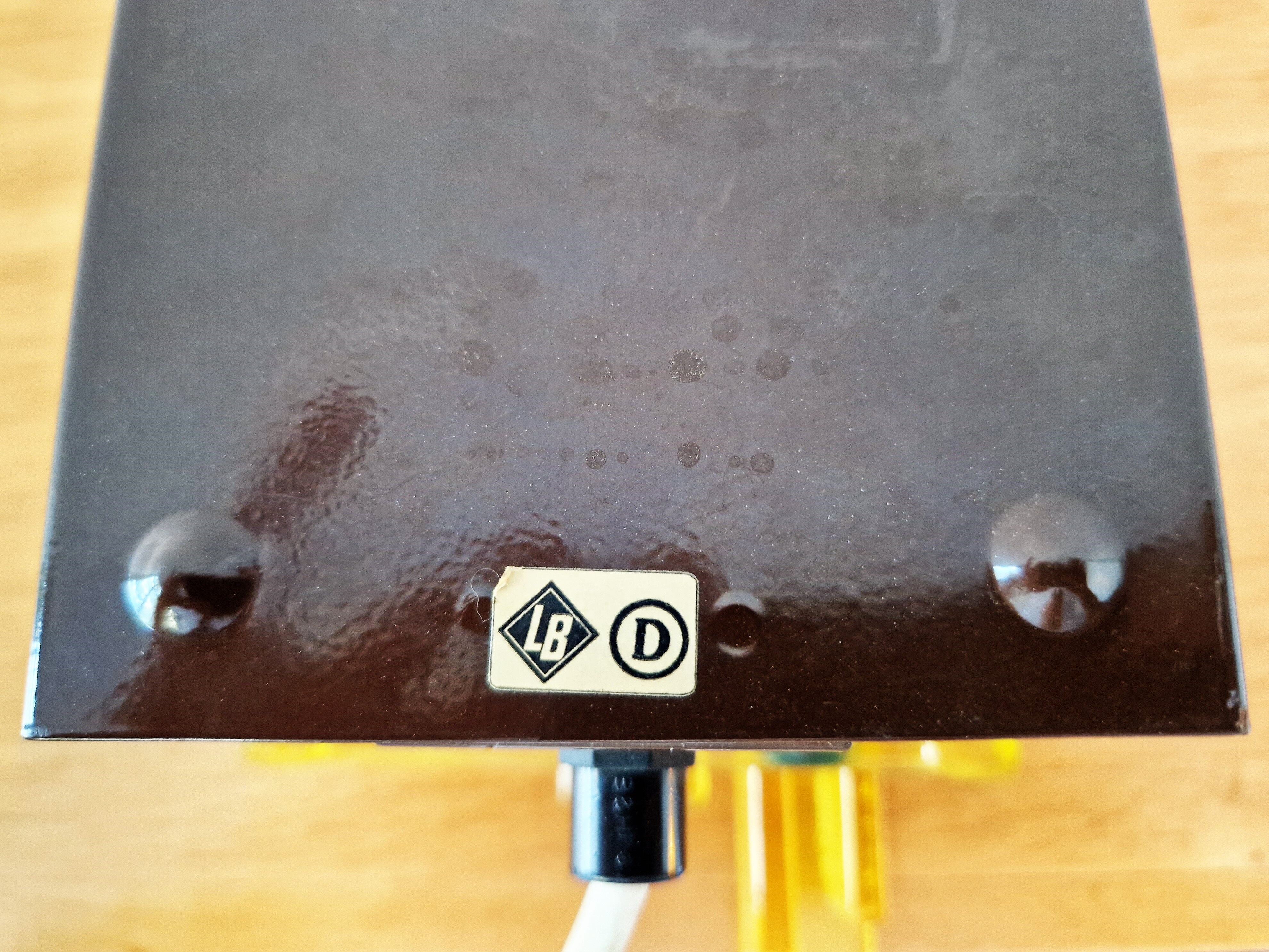 Yellow acrylic and metal wall lamp by Claus Bolby for Cebo Industri, Denmark 1960's