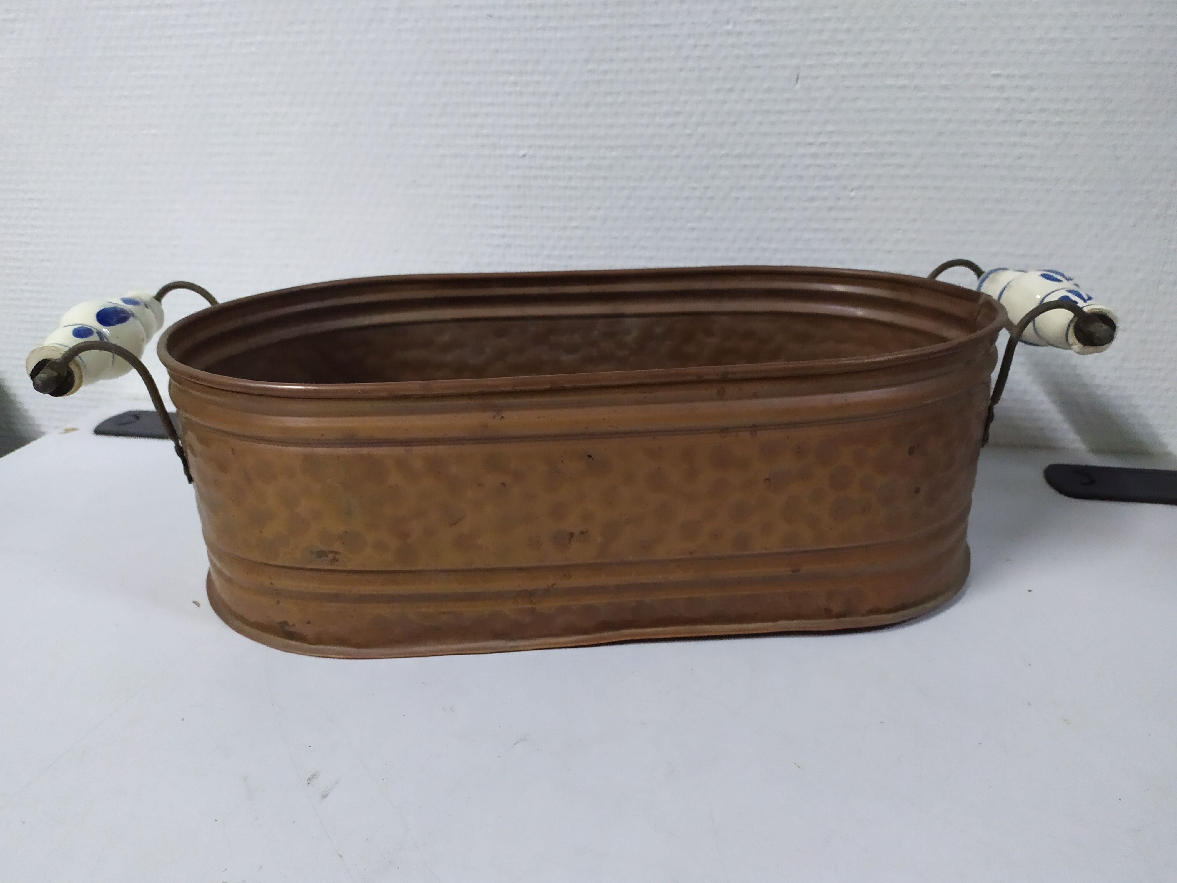 Copper planter with porcelain handles