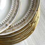 12 Limoges porcelain dessert plates, gold decoration.
