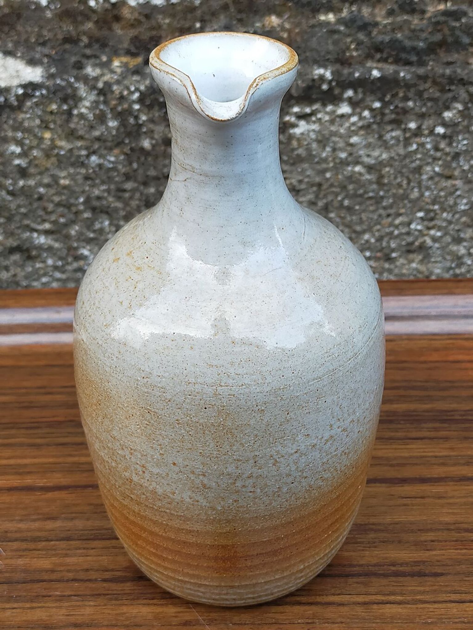 Light stoneware potter's bottle with vintage spout
