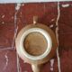 Vintage stoneware teapot and cup, "selfish" tea service, signed
