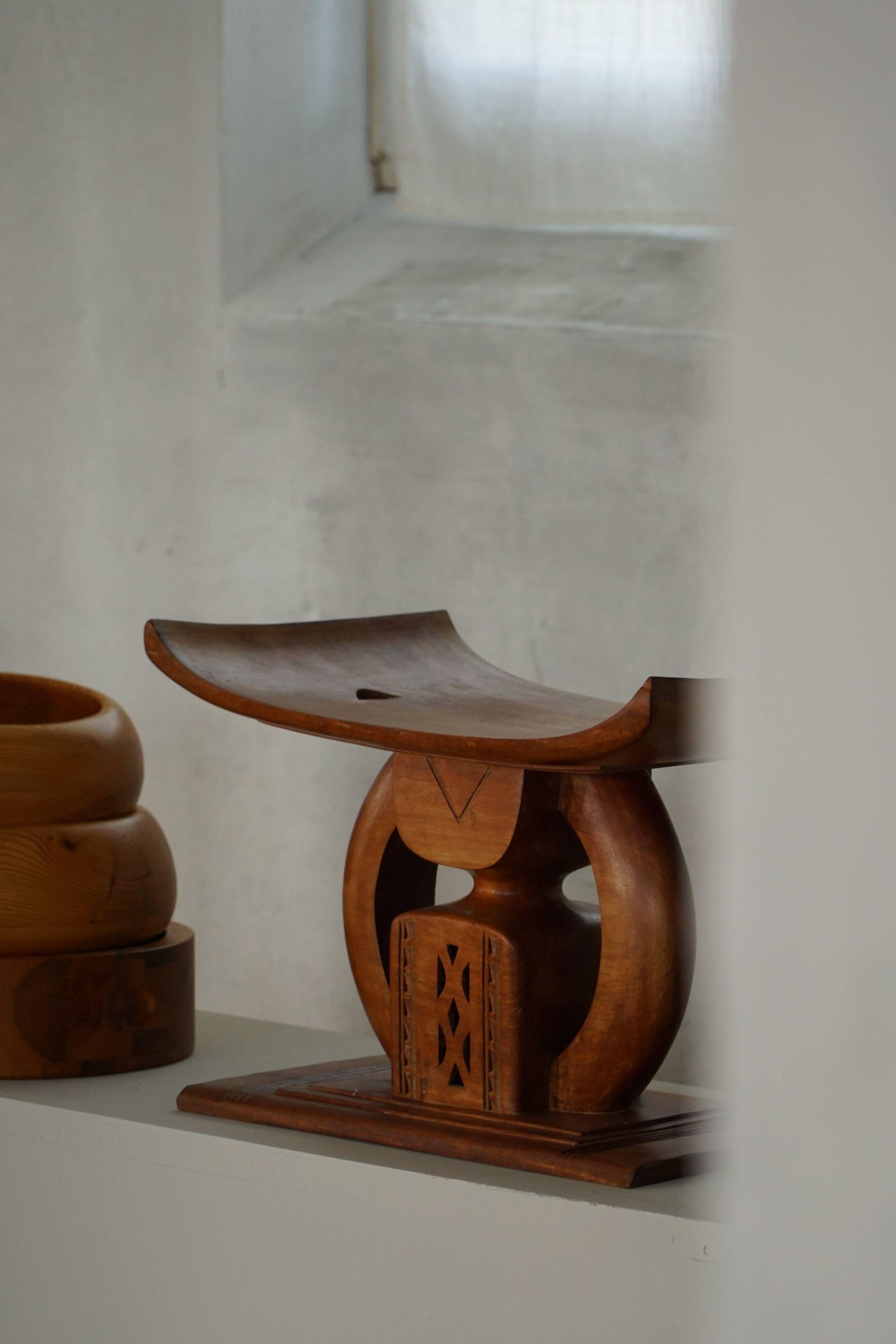 Ashanti stool from West Africa, carved from hardwood, 20th century.