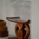 Ashanti stool from West Africa, carved from hardwood, 20th century.