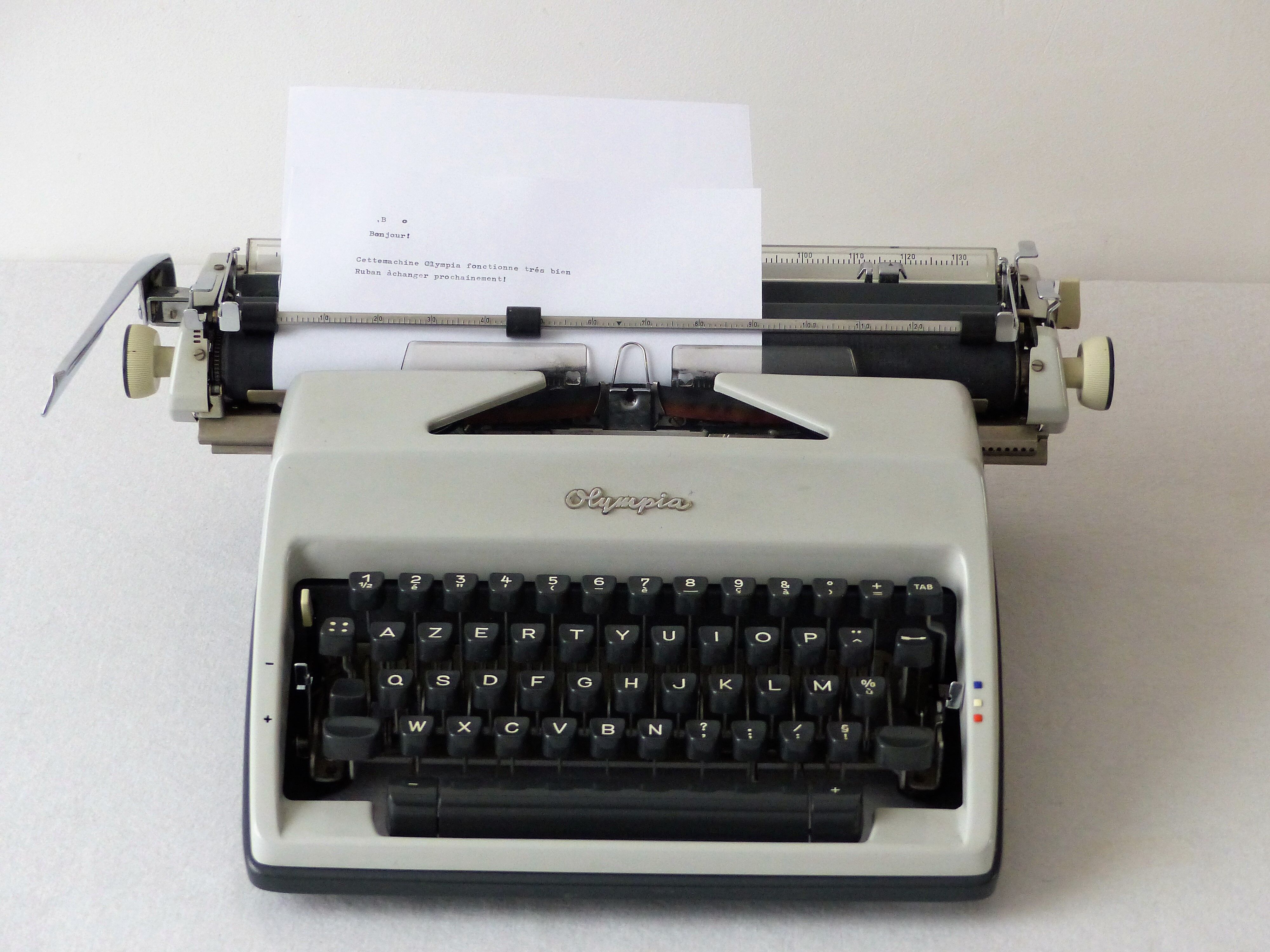 Olympia typewriter in his suitcase