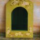 Shabby green mirror with flowers