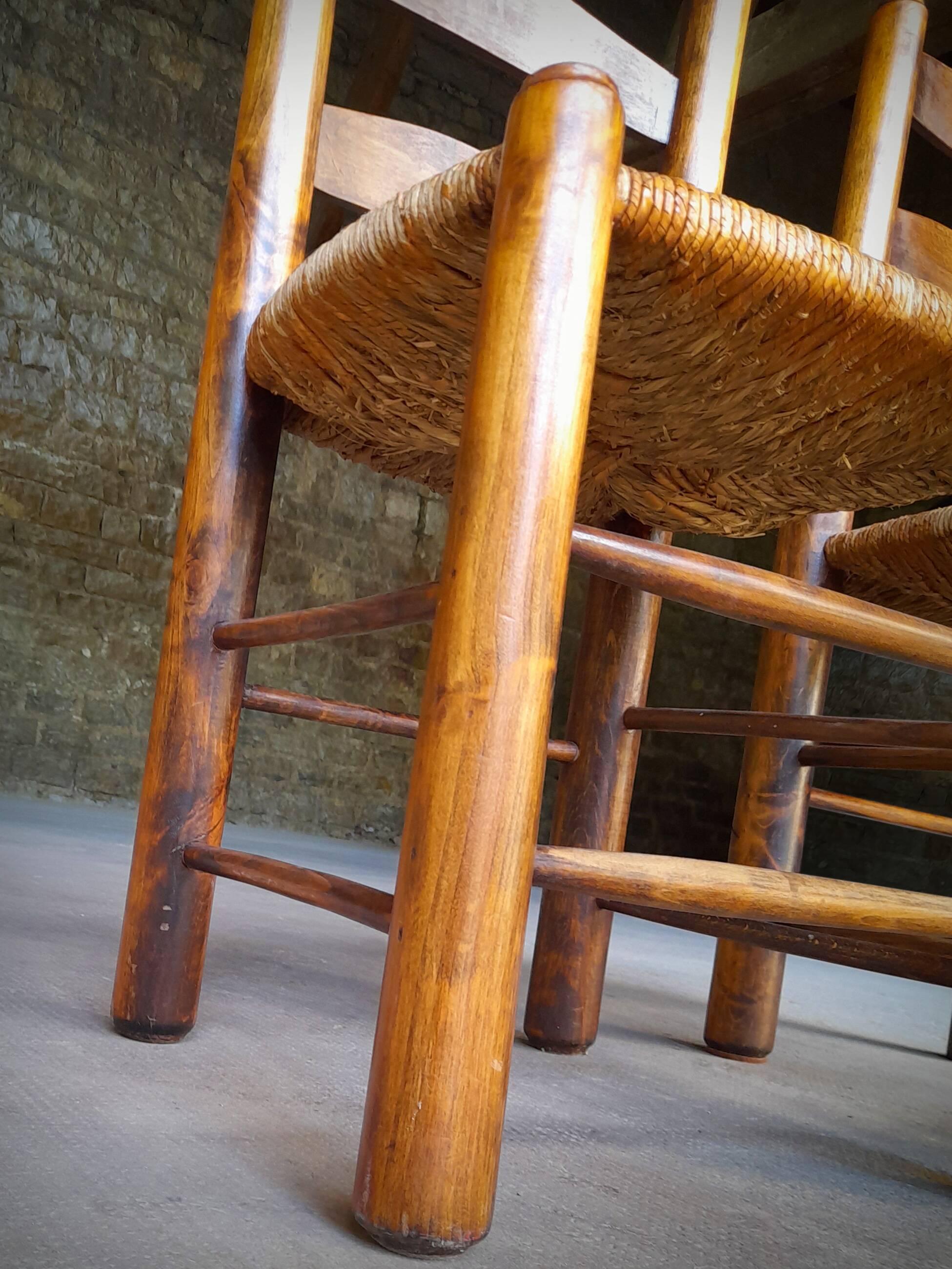 Set of 4 straw-covered brutalist chairs by George Robert