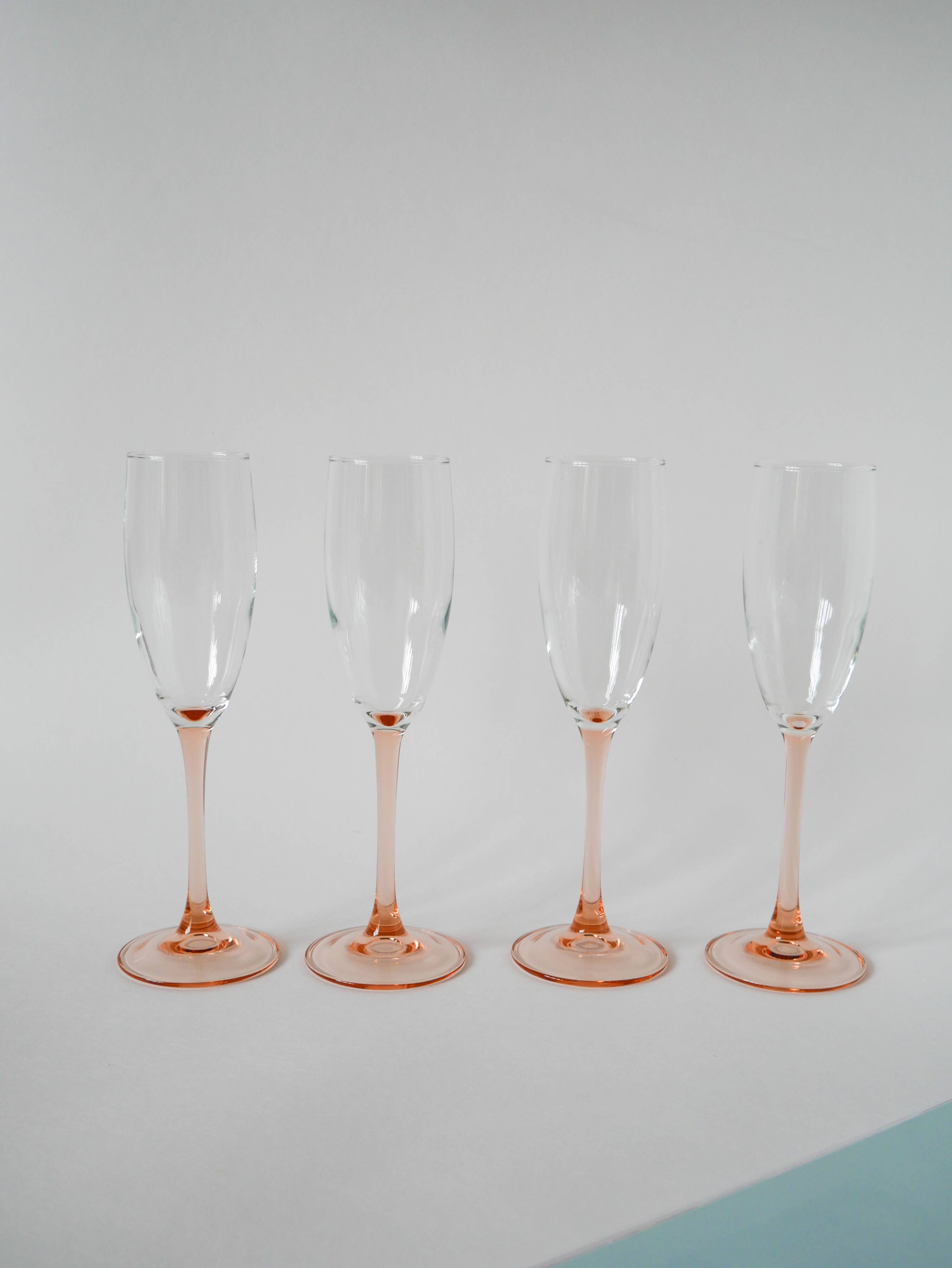 Set of 4 champagne flutes with pink feet, 1970