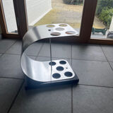 A modernist ebonised and aluminium umbrella stand