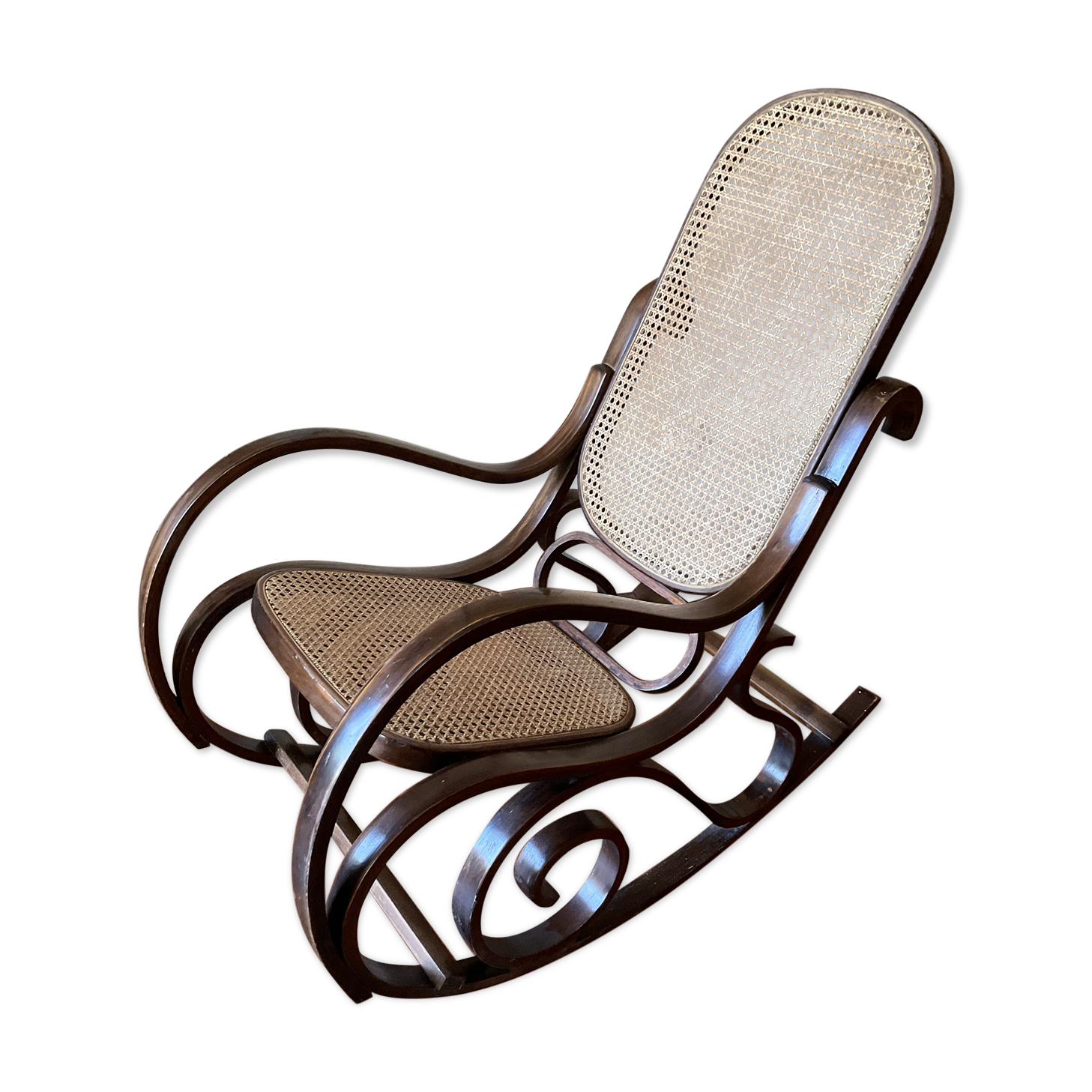Vintage rocking chair in curved wood