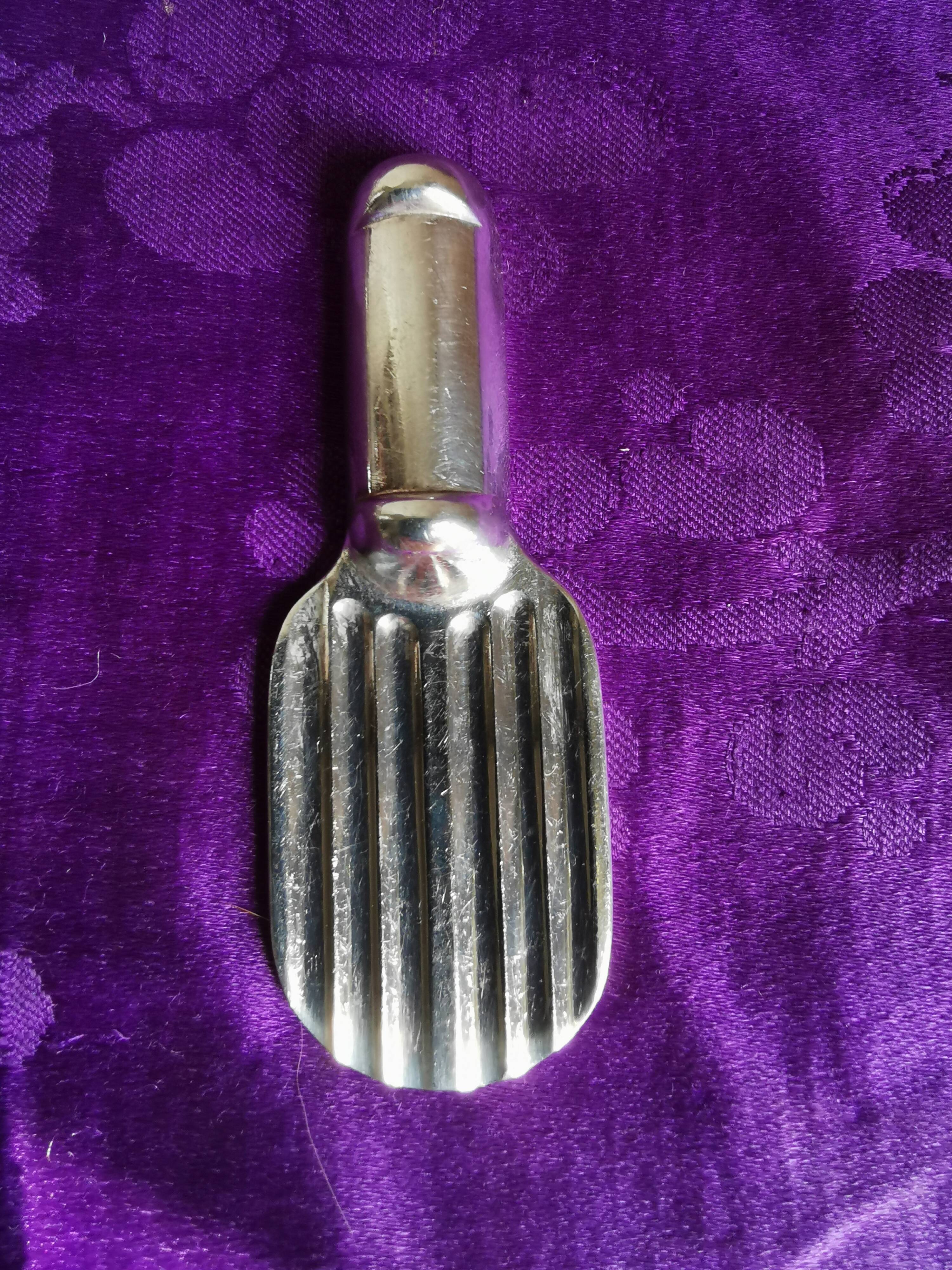 Twelve Christofle knife holders in silver metal