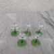5 transparent glass glasses and green glass vase go