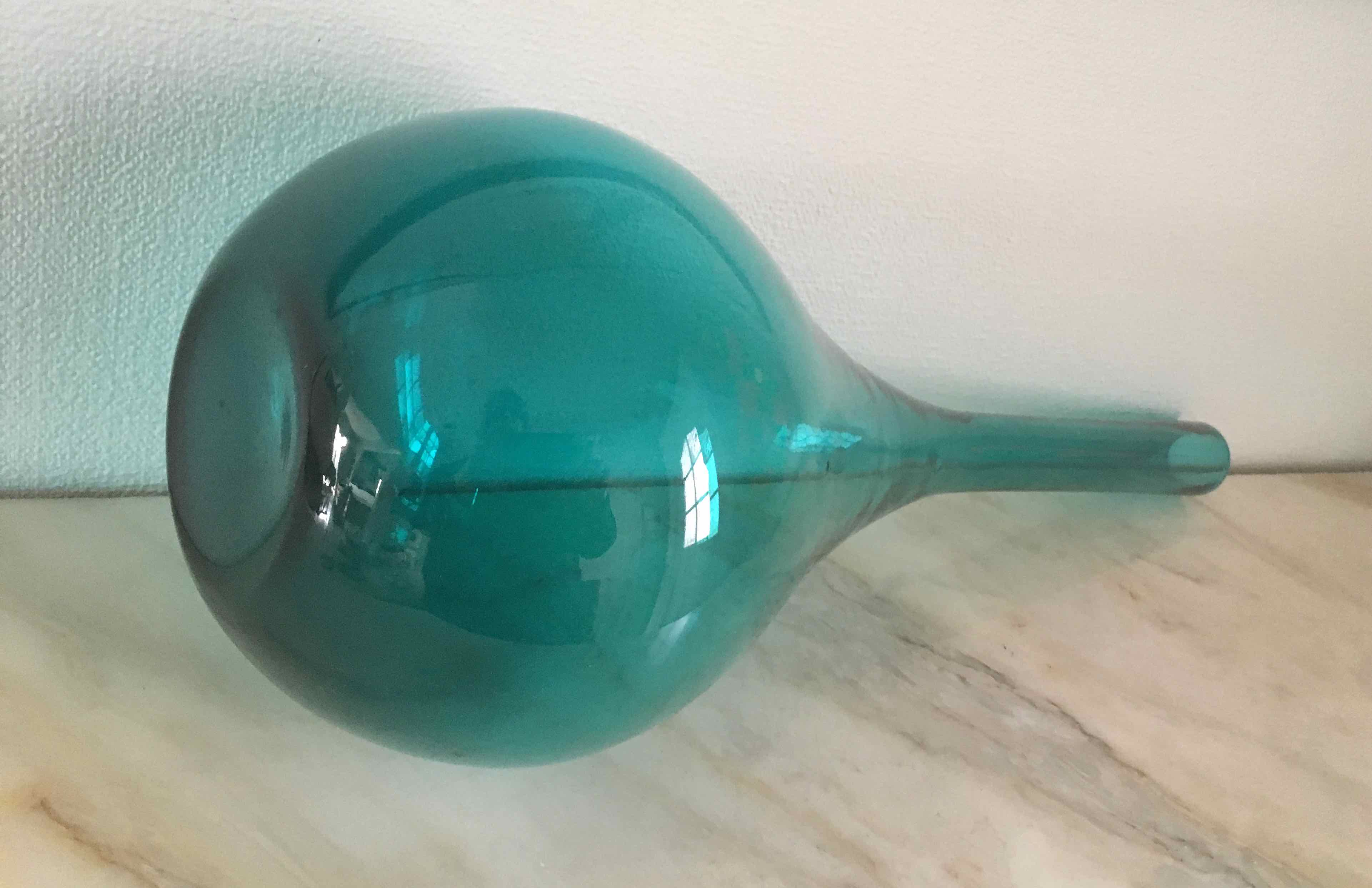 Large blown glass bottle