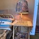 Vintage bedside table in bamboo and rattan with decorative top.