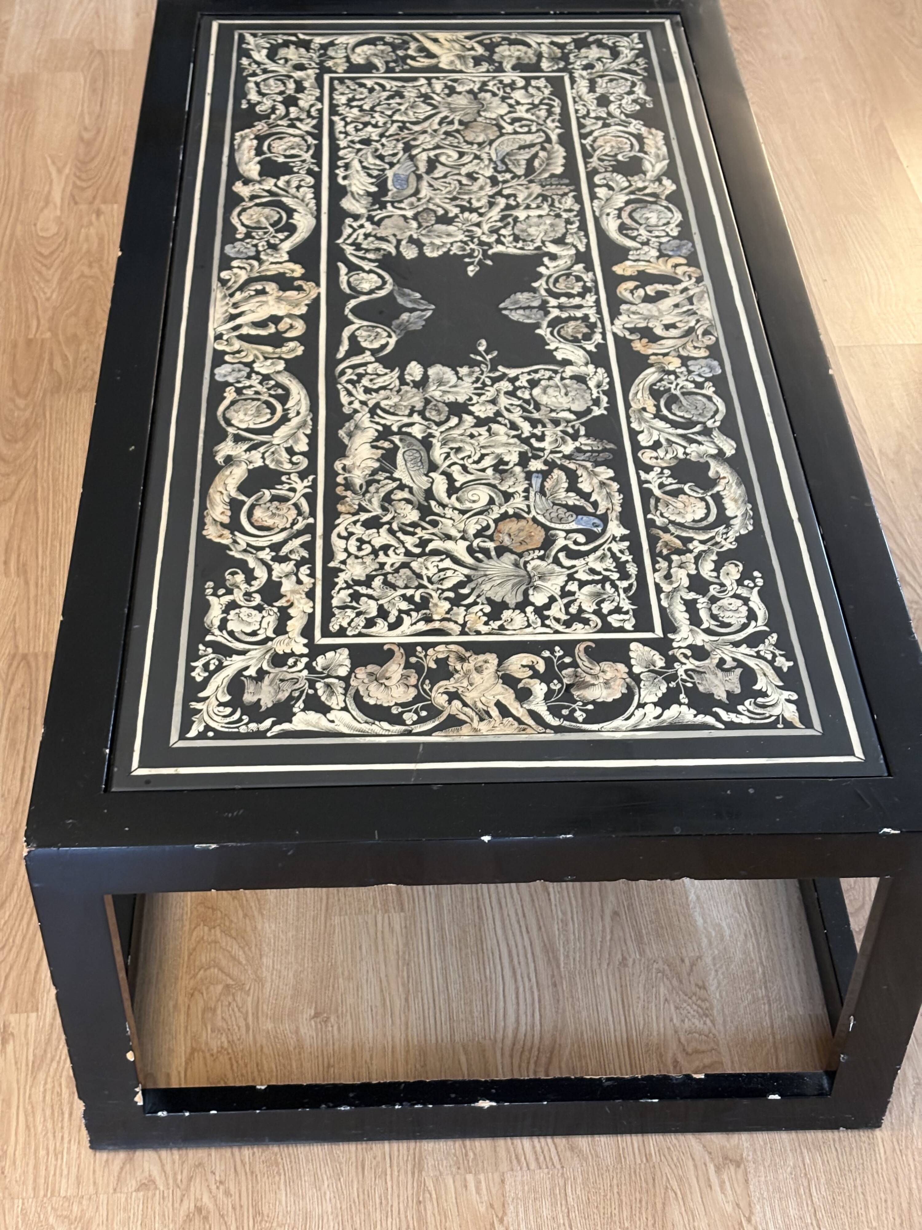 Lacquered wooden coffee table with a Scaglione marble top.