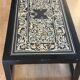 Lacquered wooden coffee table with a Scaglione marble top.