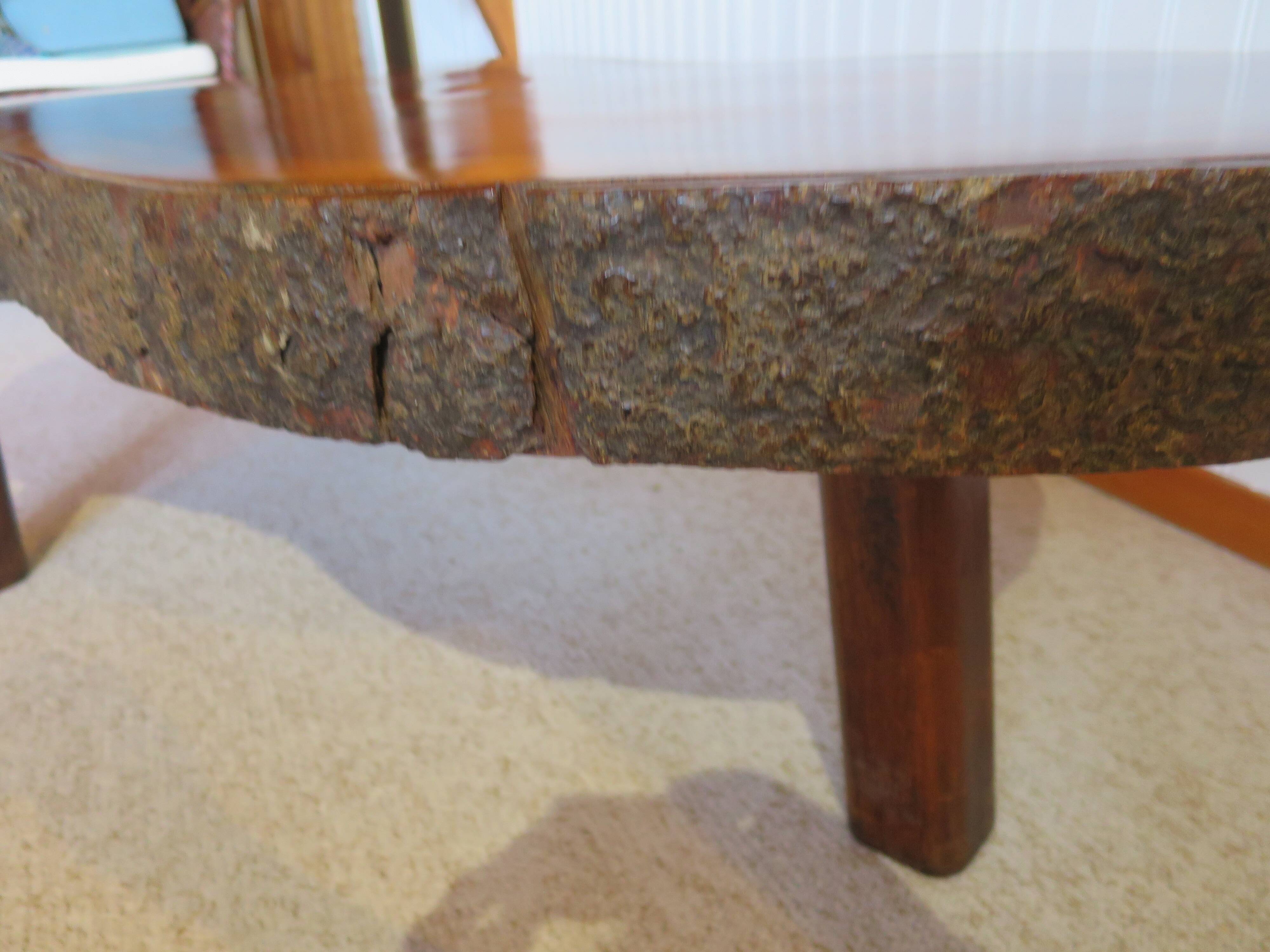 Tripod coffee table - solid okoumé wood - organic shape - brutalist style