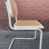 Cesca dining room chair designed by Marcel Breuer