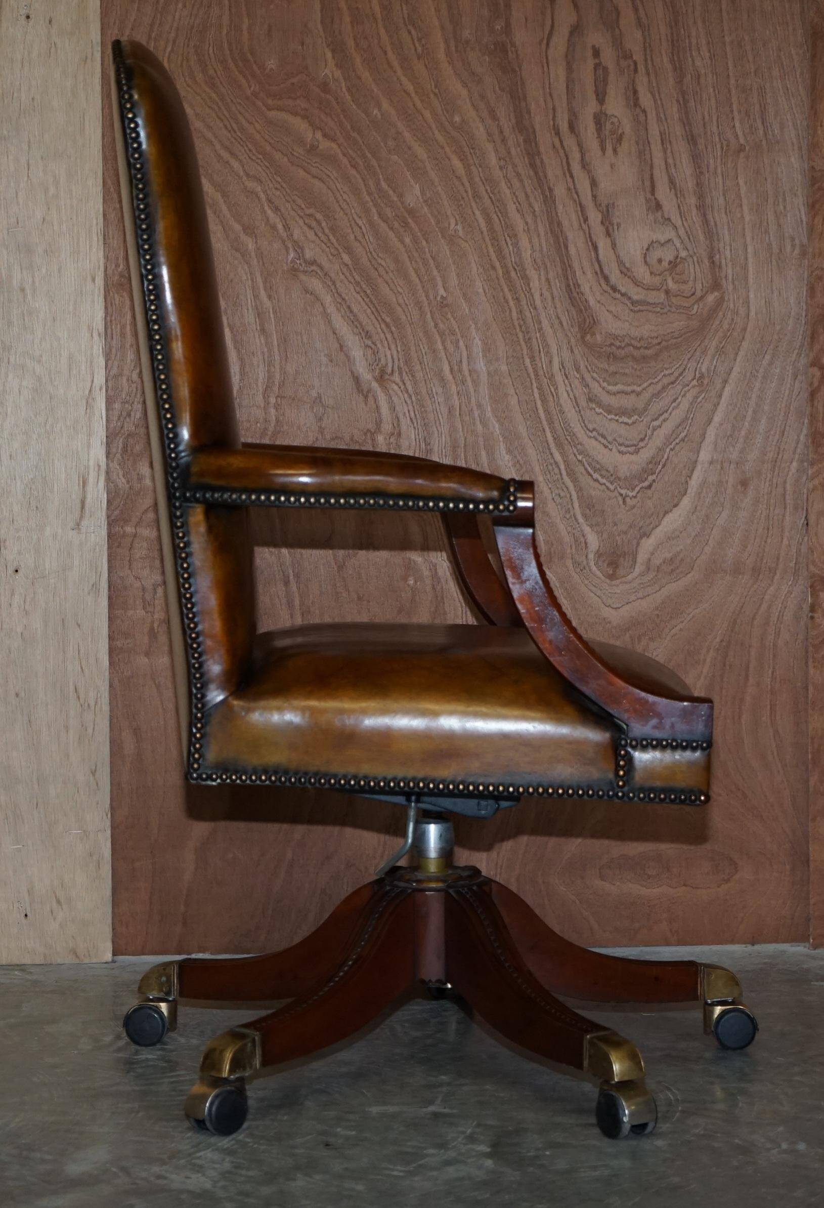 Restored vintage executive chair, leather, oak frame.