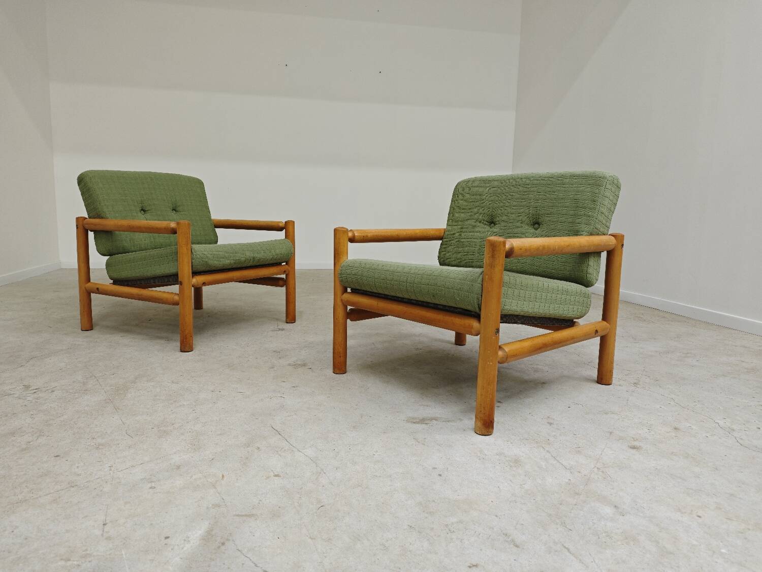 Pair of chalet style armchairs in green fabric