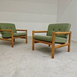 Pair of chalet style armchairs in green fabric