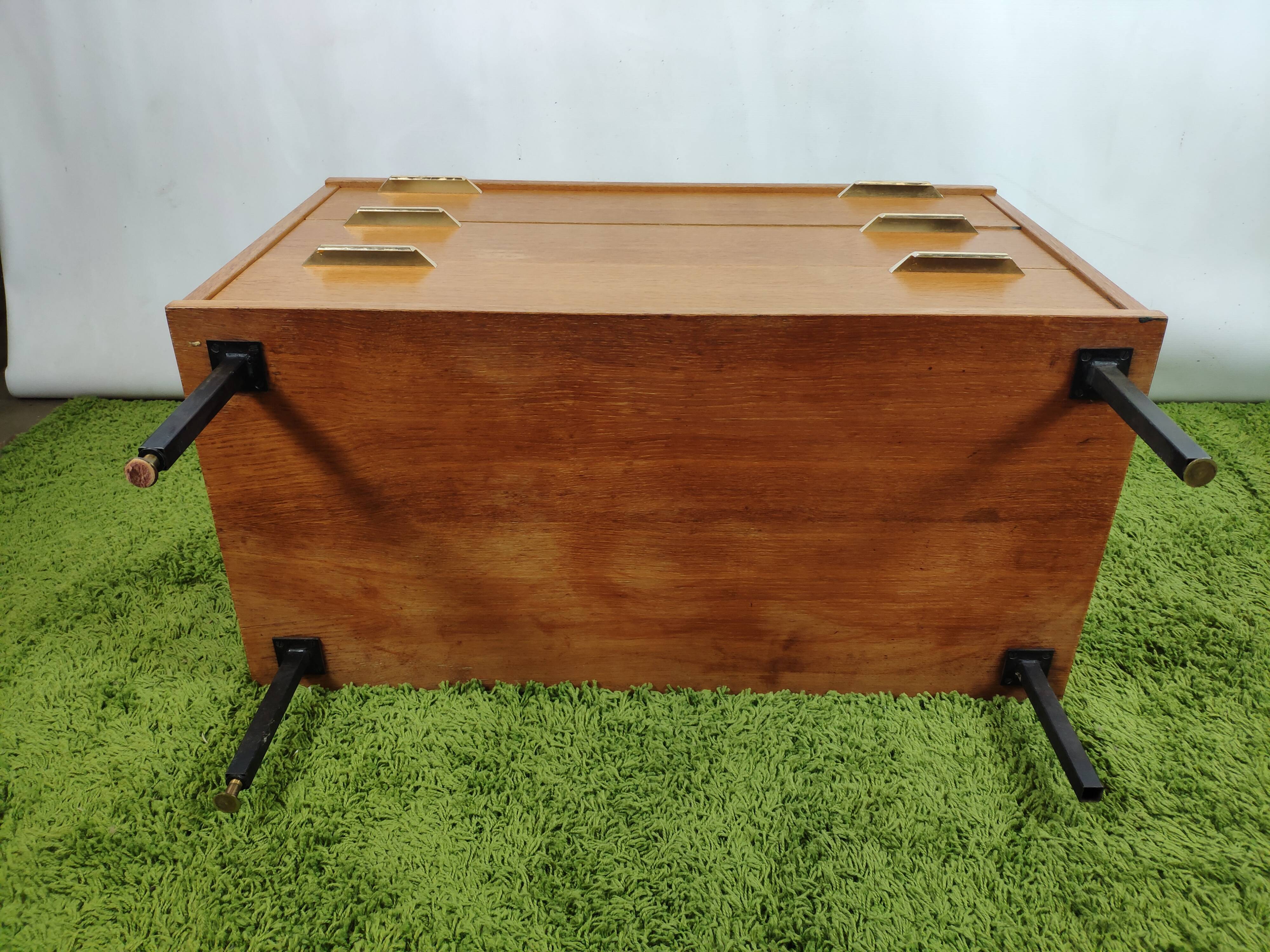 Wooden chest of drawers with gilded handle