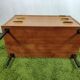 Wooden chest of drawers with gilded handle