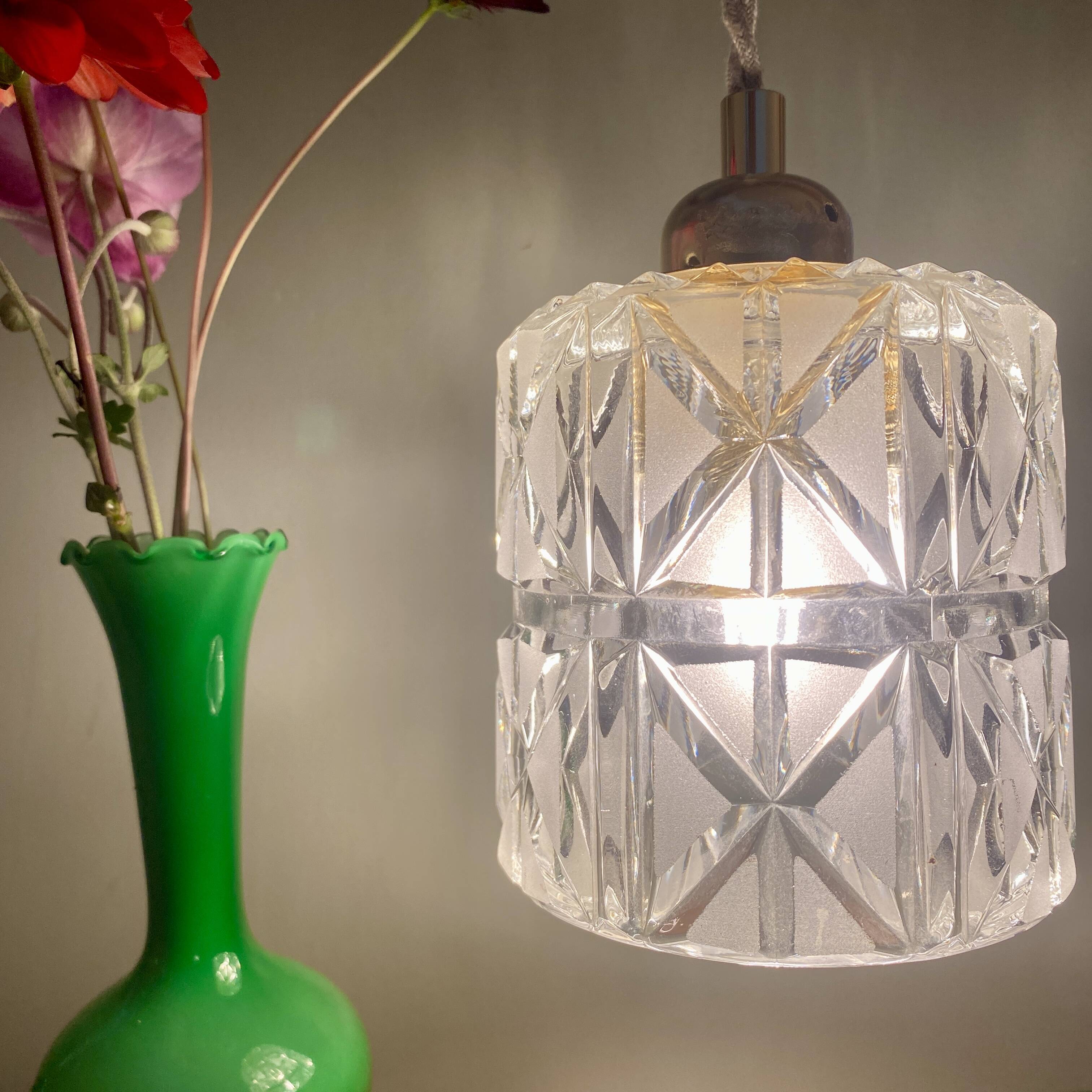 Vintage globe pendant light in thick, chiseled and frosted glass