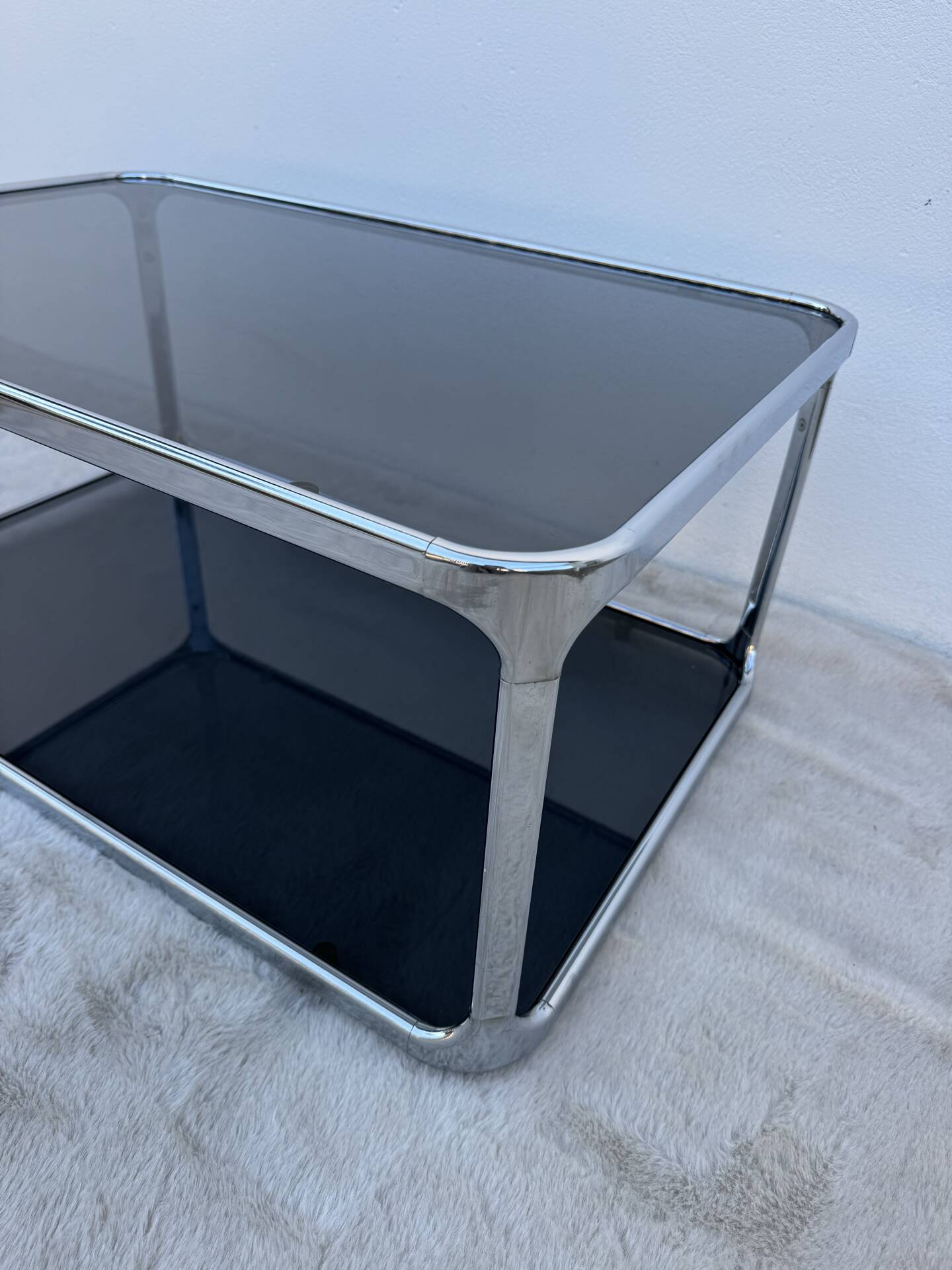 Chrome and smoked glass coffee table from the 1970s.
