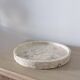 Small round tray in travertine