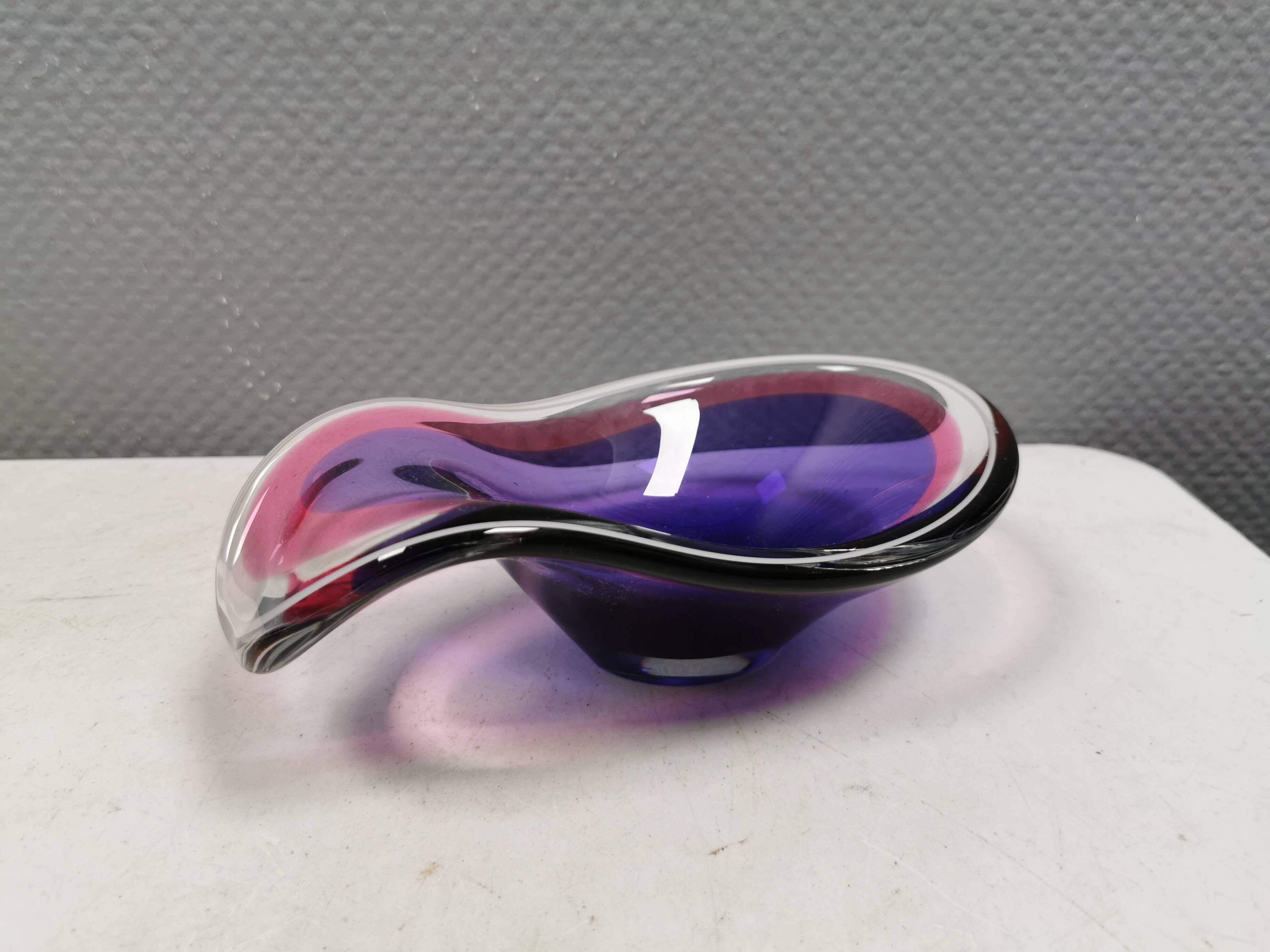 Beautiful dish/bowl in many coloured glass.