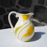 Pitcher with yellow flowers