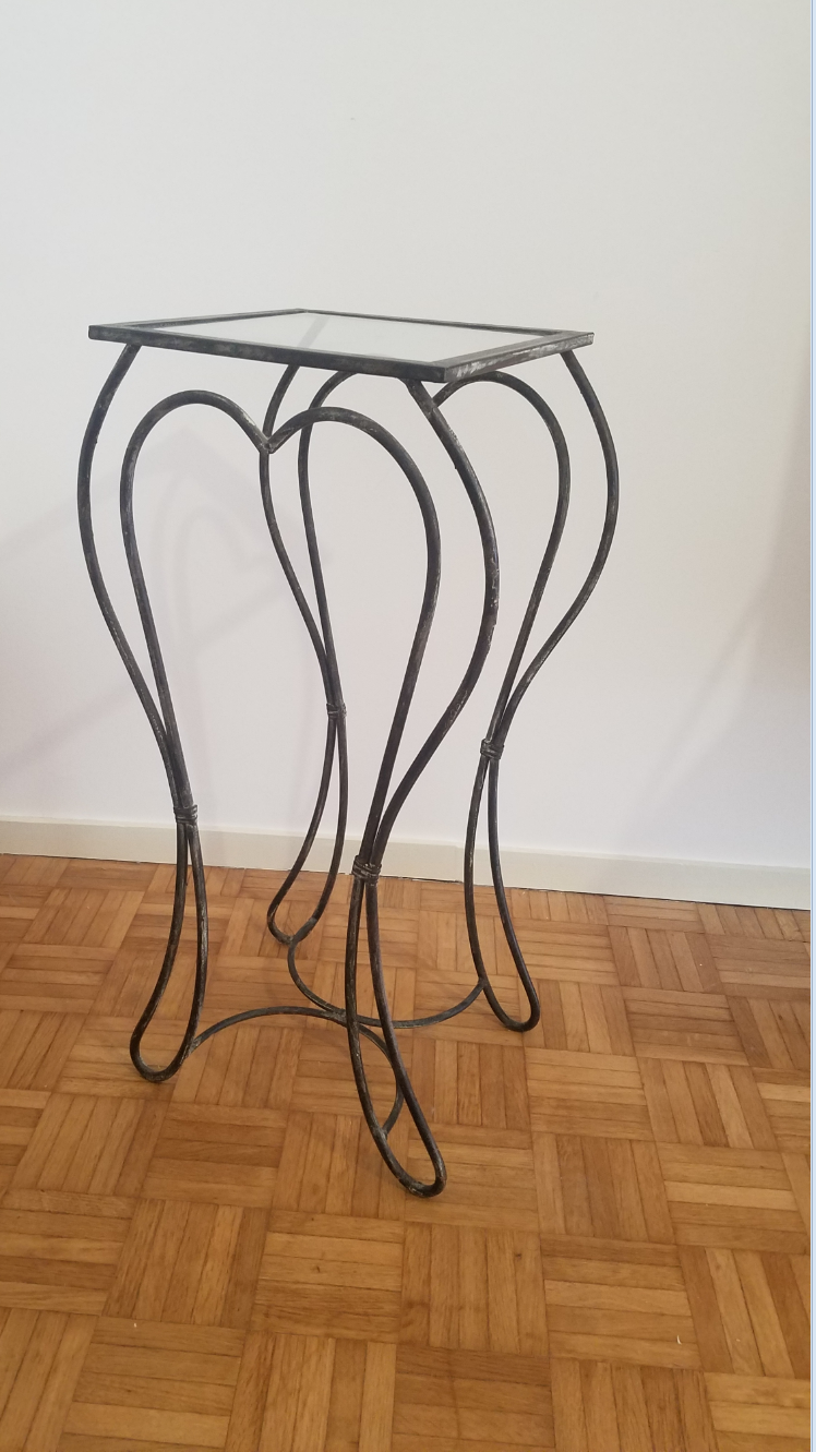 Wrought iron pedestal table