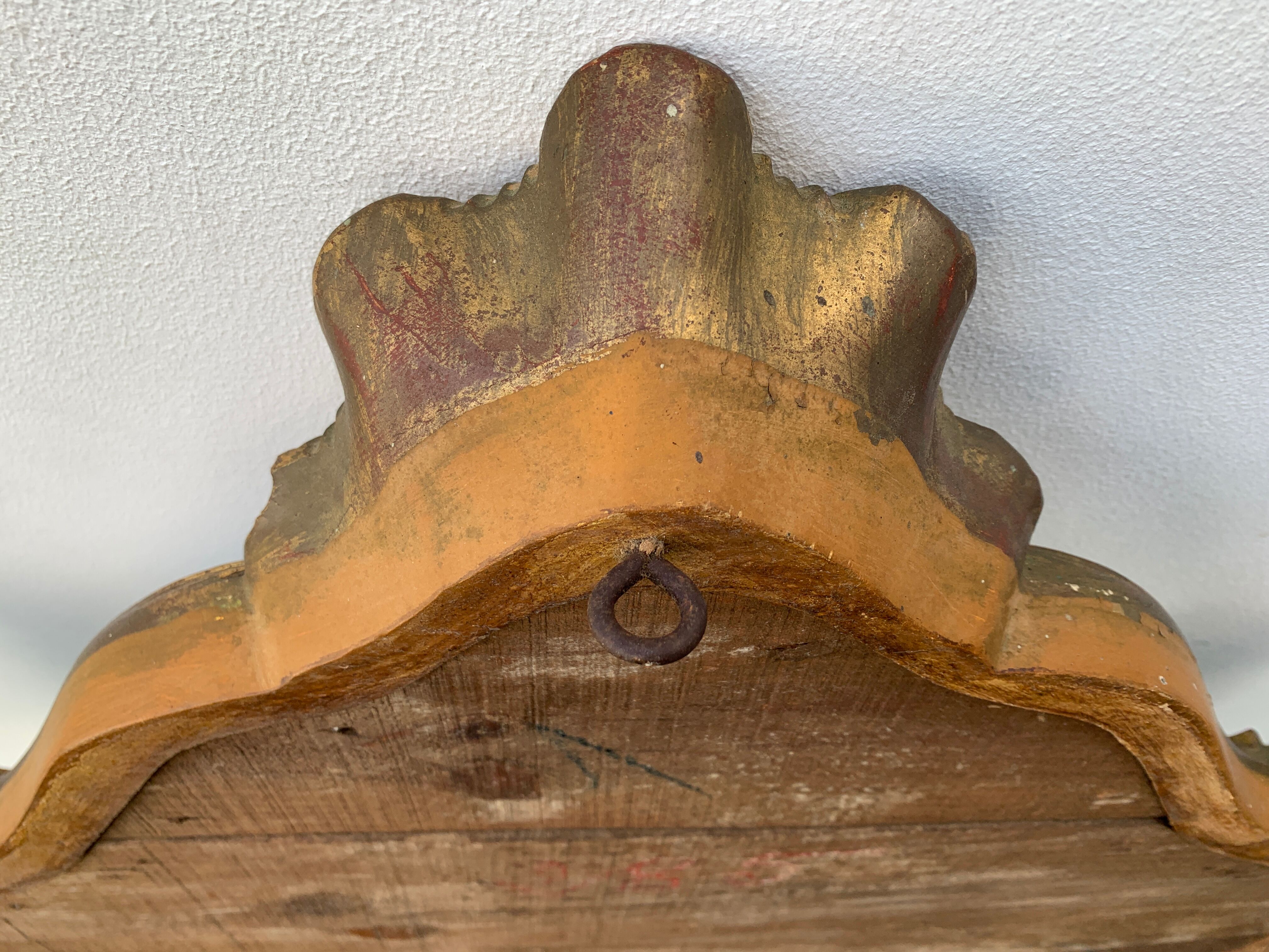 Old mirror in carved wood and gilded leaf, Louis XV rocaille style, twentieth century 59x87cm