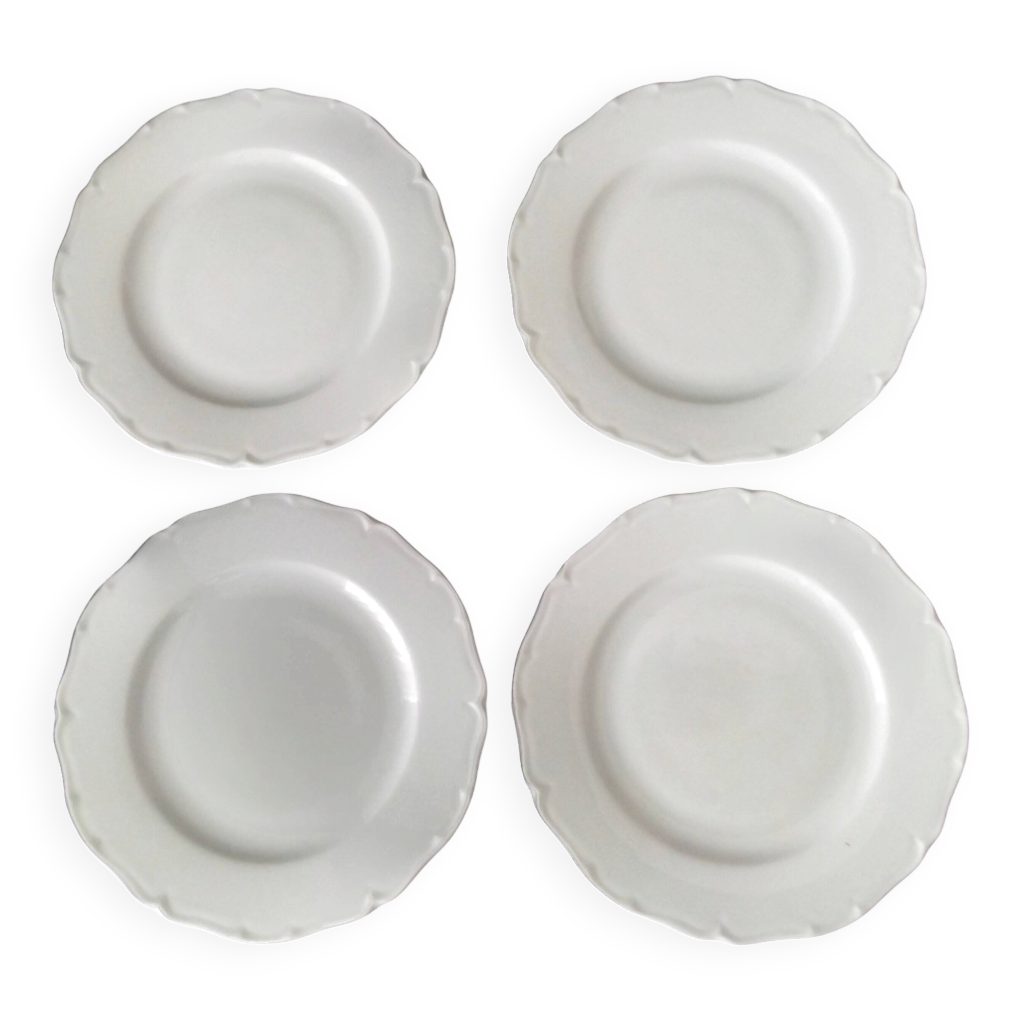 4 white Limoges porcelain dessert plates