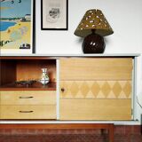 Wooden sideboard in soft green