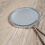 Mirror "face to hand" in chromed metal