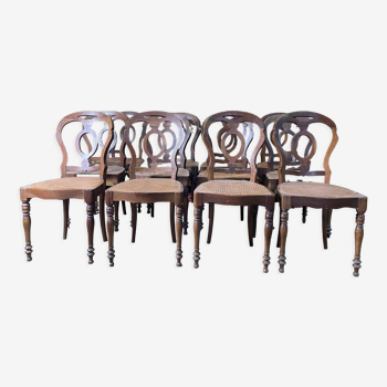 Suite of 12 Louis Philippe period chairs in walnut and canning