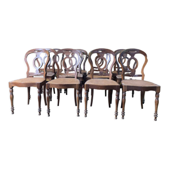 Suite of 12 Louis Philippe period chairs in walnut and canning