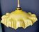 Suspension with draped yellow glass lampshade