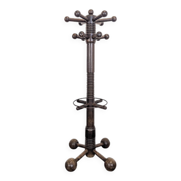 Coat rack by Charles Dudouyt in solid oak.
