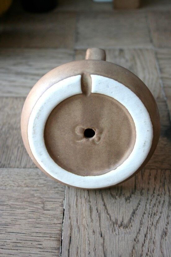 Hand-held sandstone candlestick
