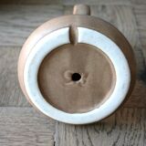 Hand-held sandstone candlestick