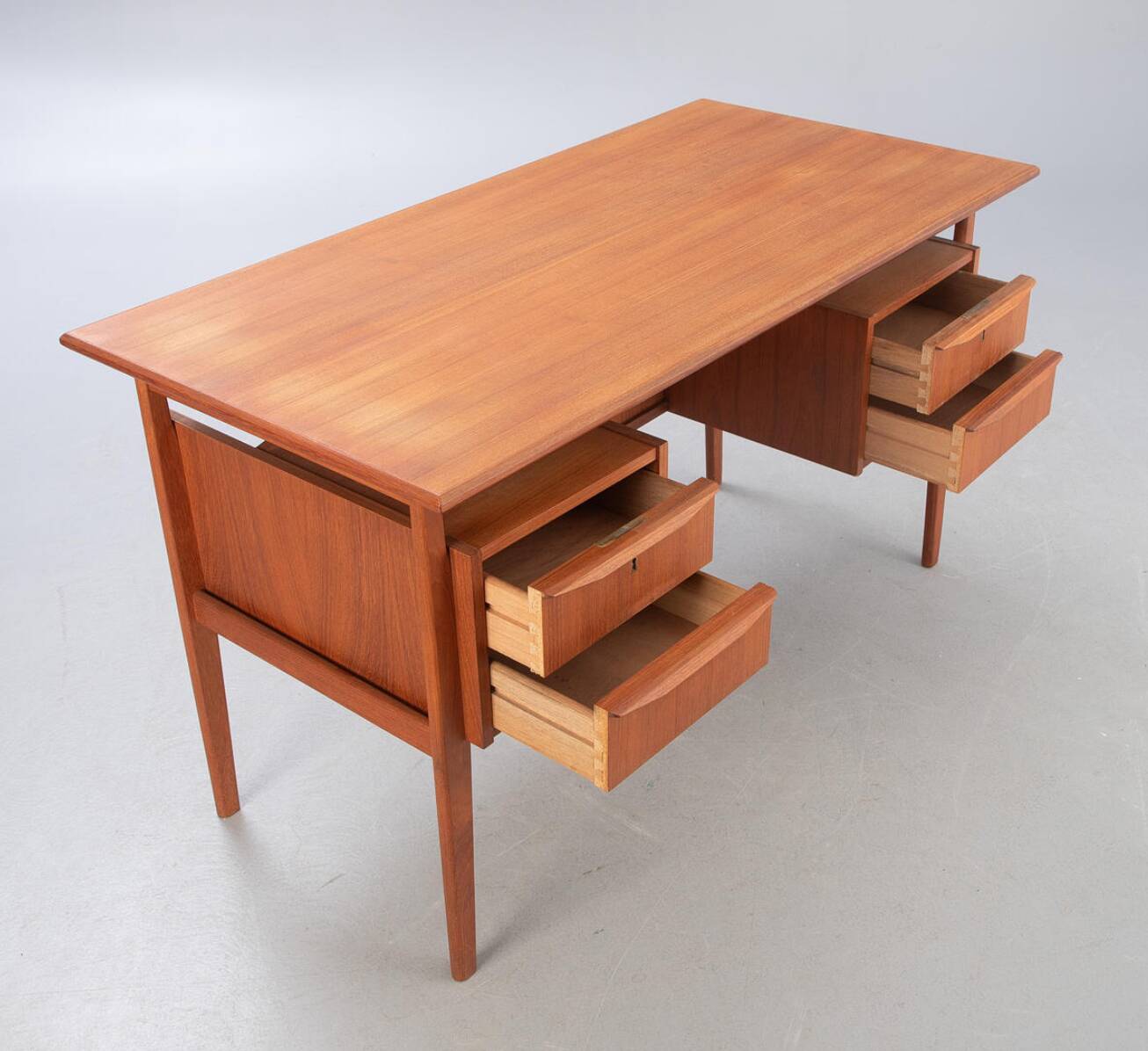 Scandinavian double-sided desk in teak by Gunnar Nielsen